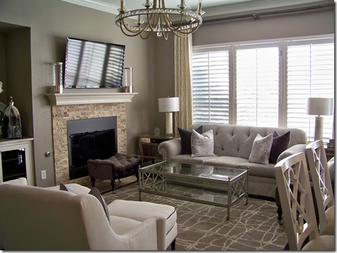 interior design chic family room, sofa and chairs and metal coffee table